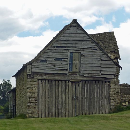 Barn circa 17 metres west of Combe House