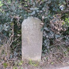 Milestone, 50m W of Stokelly Farm Shop turn, before road descends to Torcross