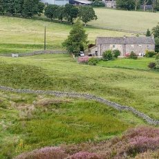 Burnfoot Farmhouse And Attached Barn To South West