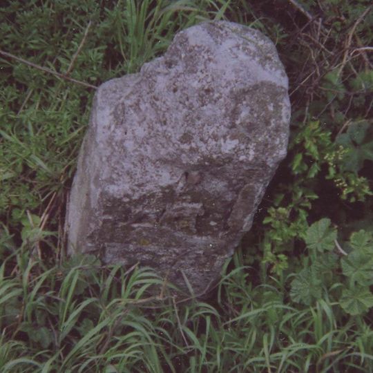 Milestone, Hythe Road, W of old filling station, beneath power lines