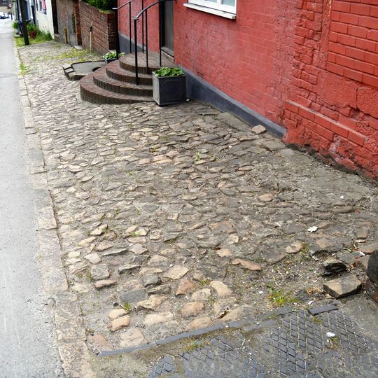 Pavement Running From In Front Of Number 5 To Just Past Number 9