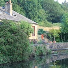 Revetment Wall To Whitecote House With Railings And Gate To Canal