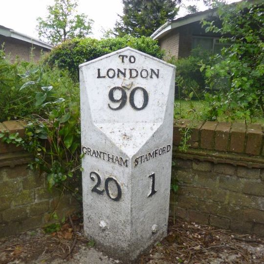 Milestone, Casterton Road, by Nos 10-11