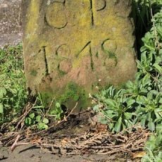 Parish Boundary Stone In Front Of Number 127