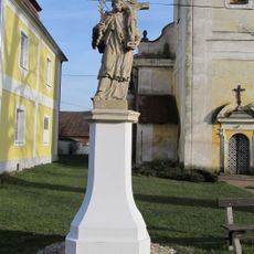 Statue of Saint John of Nepomuk in front of church