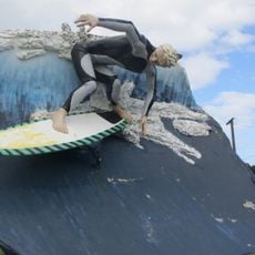 Surfer Riding a Wave