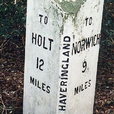 Milepost, c.20yds N of S edge of Great Wood
