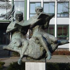 Lezende jongen en meisje