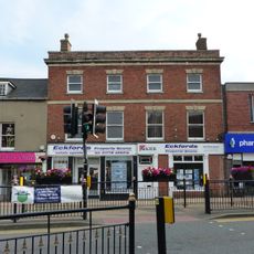 Premises adjoining item 1/13 to the west occupied by Boots and Lyall and Company