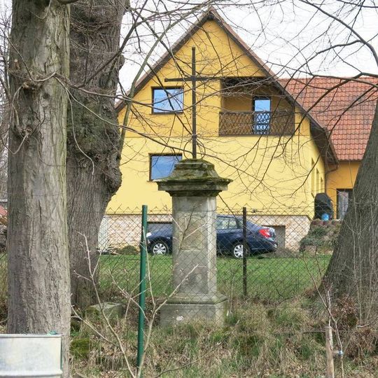 Cross in the garden of the house U Šporky 223 in Dolní Libchava