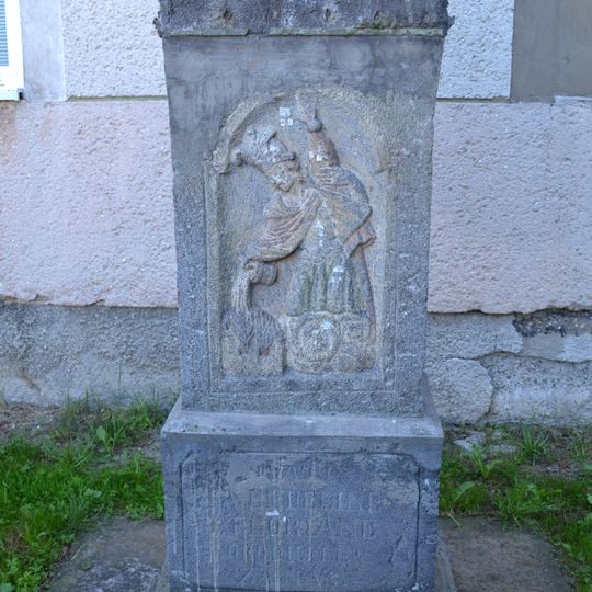 Socha sv. Vendelína, pilier s reliéfom