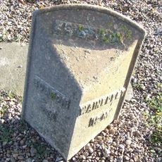 Mile Post In Centre Of Village