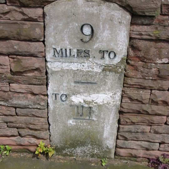Milestone, front of old police station