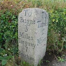 Milestone, Longcombe, 50m E of turn to Stoke Gabiel at Longcombe Cross, opp. South Hams Motor Company
