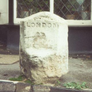 Milestone In Pavement Outside Church Cottage