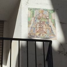 Ceramic panel of Our Lady of the Forsaken at 12 Natividad Domínguez street