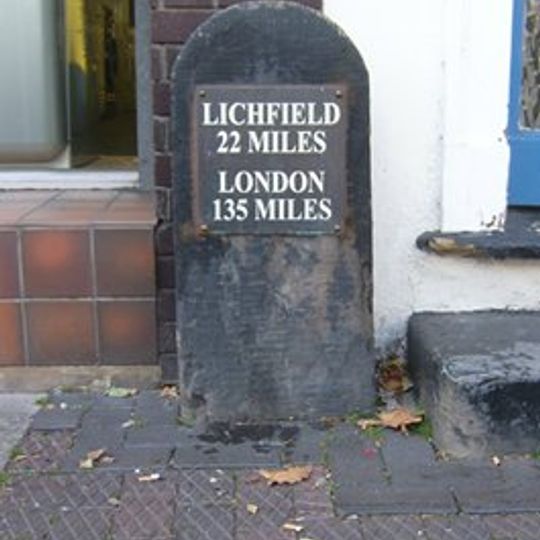 Milestone In Front Of Number 64