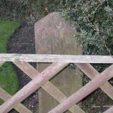 Milestone in the grounds of Acorn Cottage