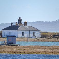 Lighthouse Keeper's Cottage At Hurst Lighthouse And Attached Yard Wall