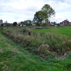 Moated site and associated ridge and furrow cultivation remains, 145m south of St Mary Magdalene's Church