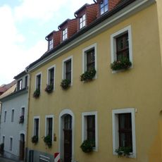 Wohnhaus in nach rechts geschlossener Bebauung, Ecklage Große Wallstraße 15 (Kleine Wallstraße 9)