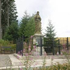 Socha Krista v lesoparku v Perninku