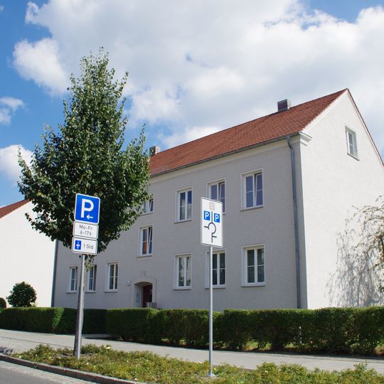 Wohnanlage Poststraße, Straße des Aufbaus mit Schule