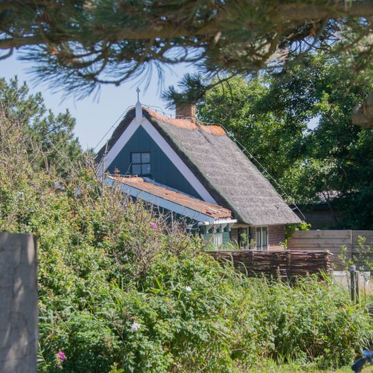 Vrijstaande voormalige arbeiderswoning