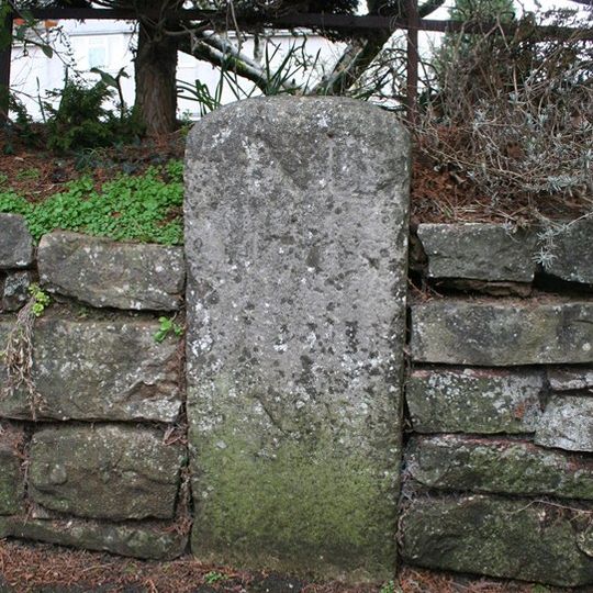 Milestone, Exeter Road, opp. Golden Dragon Restaurant, left of bus shelter