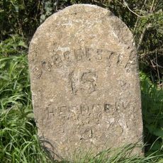 Milestone, by entrance to Vetinary clinic