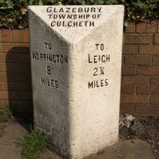 Milestone, Warrington Road, Glazebury; 100m S of Chat Moss Hotel, by No. 215