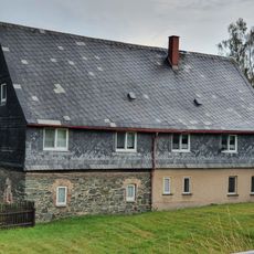 Seitengebäude (Stallscheune) eines Dreiseithofes Hauptstraße 72