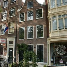 House with clock shaped gable