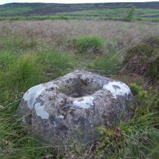 Medieval cross base 780m south west of Arkwright Plantation
