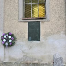 Pamětní deska padlým v 1. světové válce na kapli v Kostomlátkách