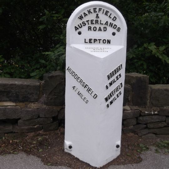 3.25 Miles Post In Front Of Football Ground