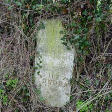 Milestone, 50m S of jct withA4151