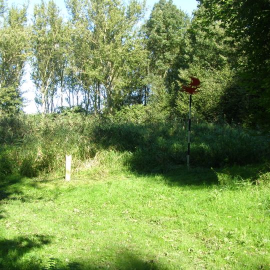 Terrein met daarin het wrak van een vrachtschip
