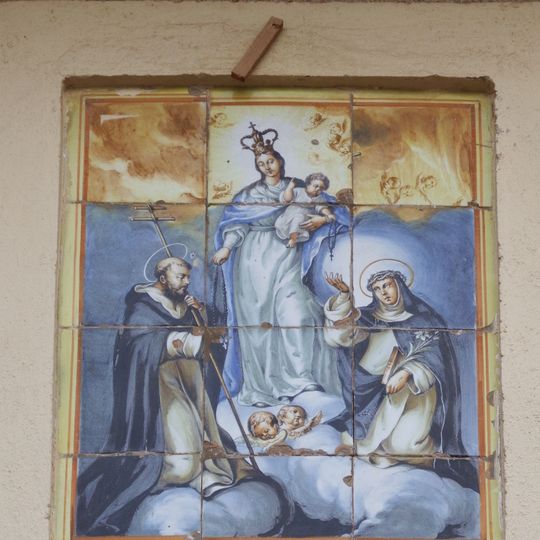 Ceramic panel of Our Lady of the Rosary at Sant Domènec street