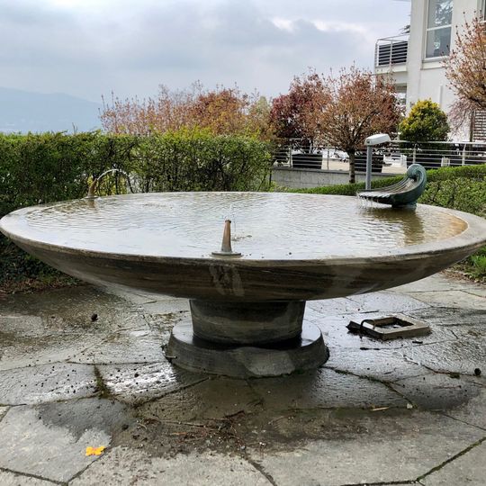 Brunnen mit Wassermuschel