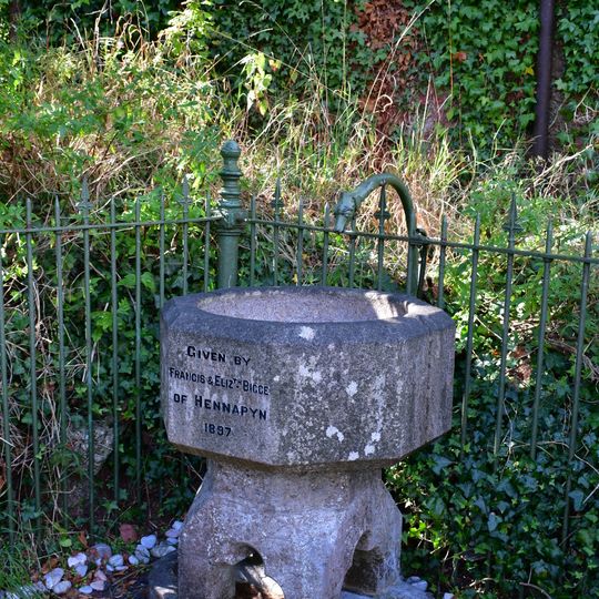 Chelston Drinking Fountain And Railings Enclosing Green