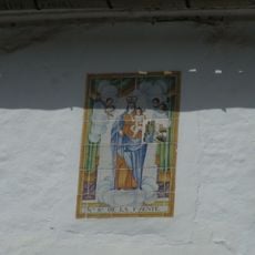 Ceramic panel of Our Lady of the Fountain at 5 Enginyer Roselló street