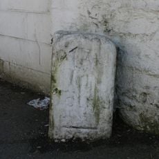 Milestone, Main Road, by Brixton Fish & Chip shop, 30m E of Steer Point Road