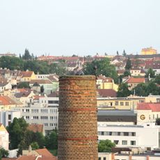 Železná socha na komíně