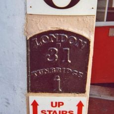 Milestone, Railway Approach, close to N of Pembury Road, in wall of Beat N Track shop