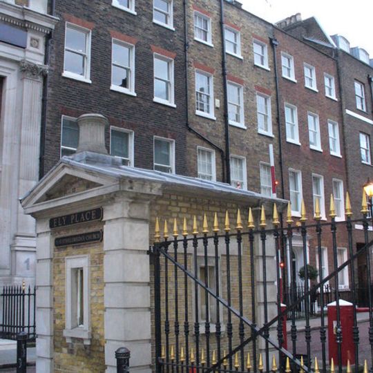 Porters Lodge At Entrance And Attached Gates, Standards And Spur Stones