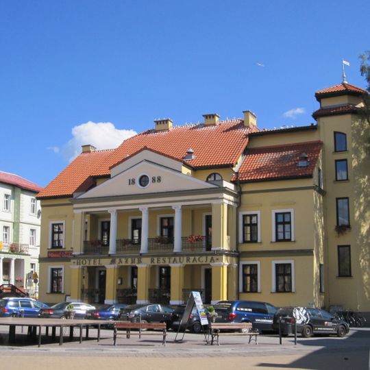 6 Wolności Square in Mikołajki