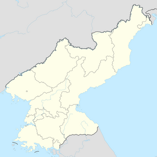 Sarang-bong (tumoy sa bukid sa Amihanang Korea, lat 40,99, long 126,93)