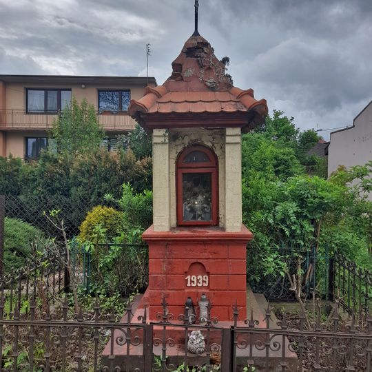 Christian wayside shrine at 43 Krakowskie Przedmieście Street in Piotrków Trybunalski