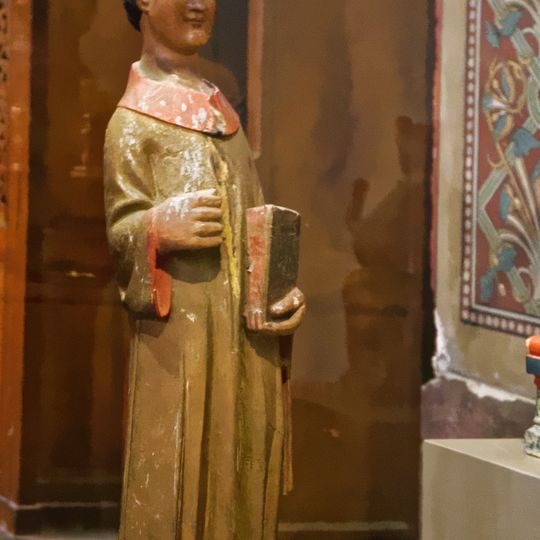 Saint Stepen holding a book in Our Lady church of Bagnères-de-Luchon